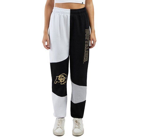 White, gray, and black patchwork sweatpants with "Buffaloes" written along the left leg and a C-U Buffalo logo on the right knee.